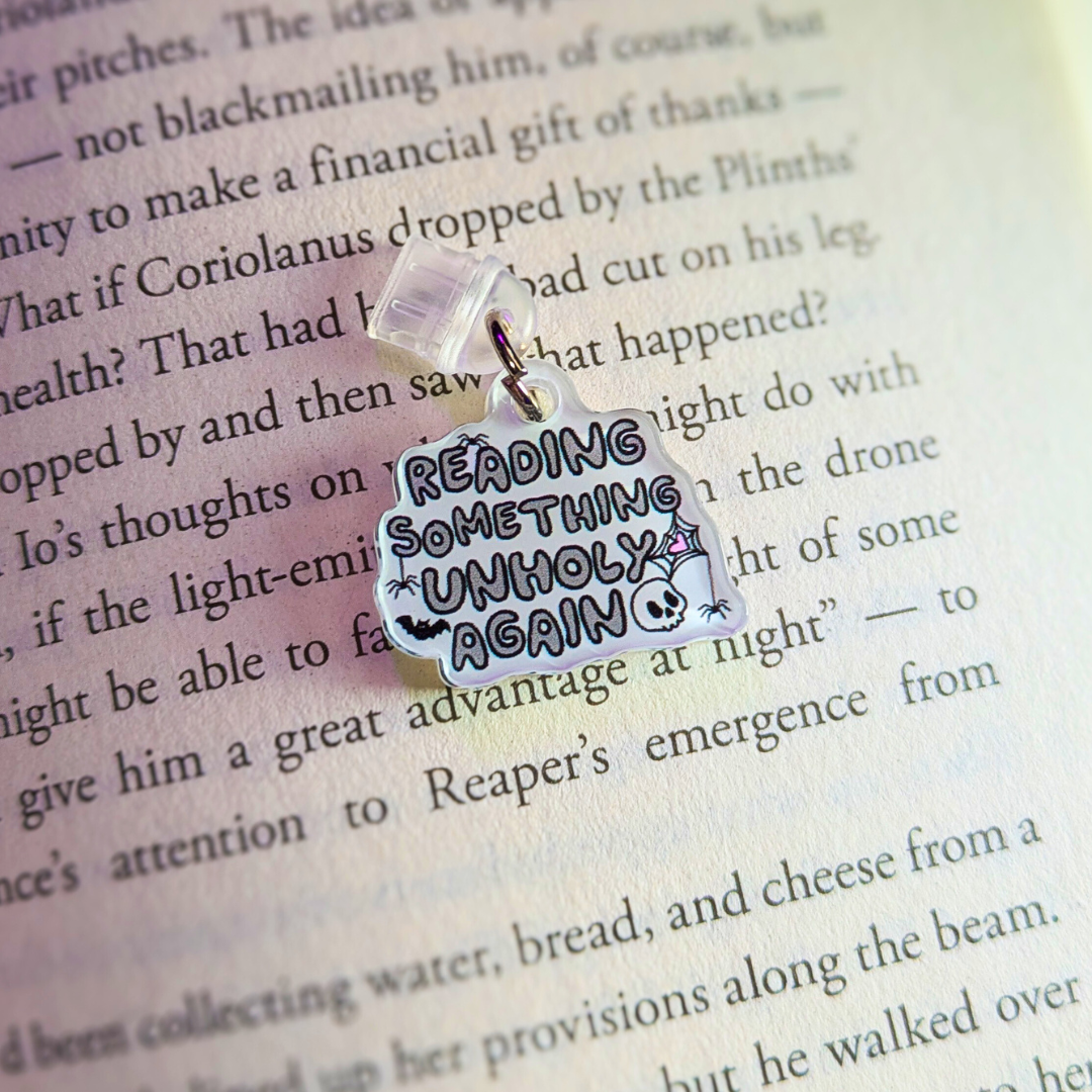 Reading Something Unholy Again Plug Charm