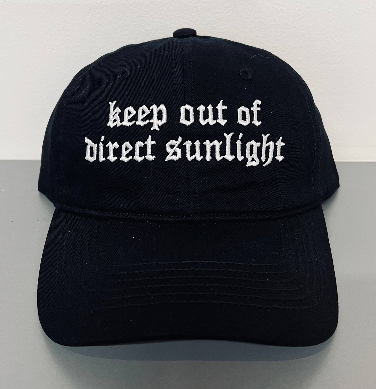 Keep out of direct sunlight - embroidered dad hat